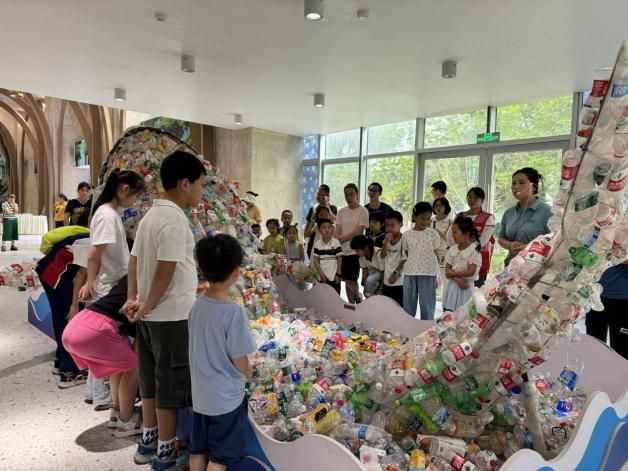 米乐M6：沙河社区开展垃圾分类环保亲子研学活动